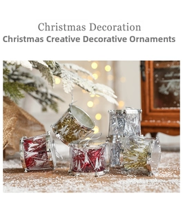 Close-up of vibrant red, gold, and silver Christmas drum ornaments with snowflake motifs
