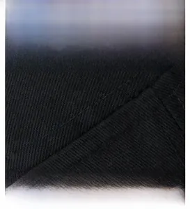 Detailed view of black twill fabric with precision double-stitch sewing and durable texture