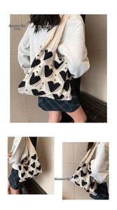 Close-up of the heart pattern texture on this knit shoulder tote bag for women