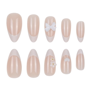 French almond press-on nails with 3D white bows, flowers and heart accents
