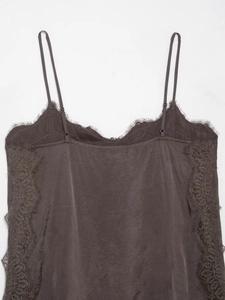 Detailed view of dark taupe satin camisole featuring delicate lace trim and silk texture