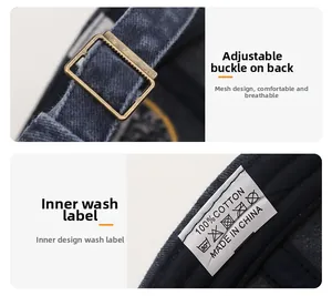 Detail of vintage copper metal buckle and inner cotton wash label on washed baseball cap