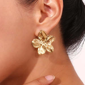 Golden petal flower stud earrings with a brushed metallic texture for a stylish look