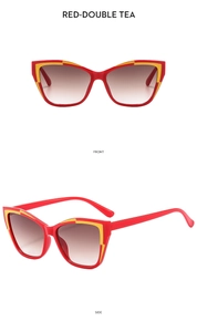 Detail view showing front and side of red cat-eye sunglasses with yellow accents