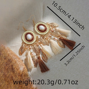 Detail view of Bohemian tassel earrings with dimensions 10.5cm by 3.2cm and 20.3g weight