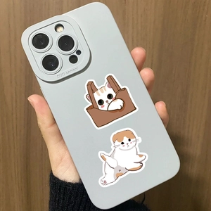 Detail of grey silicone phone case featuring cute cartoon cat prints for iPhone models