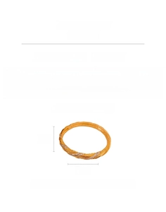 Detail showing 31.5g gold-plated copper twisted bangle with zircon stones and 6.7cm diameter