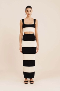 Detail view of the striped knit two-piece set with square neck top and high waist skirt
