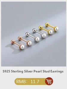 Detailed macro view of S925 sterling silver pearl stud earrings with screw back design