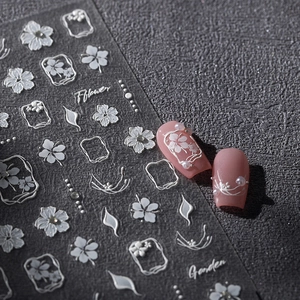 3D white embossed flower nail art stickers with baroque patterns on pink nails