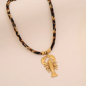 Leopard print woven rope necklace with a large golden lobster pendant for women