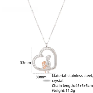 Detail of mother and daughter silhouette heart pendant with crystal in stainless steel