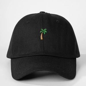 Detailed view of black cotton baseball cap featuring high-quality palm tree embroidery