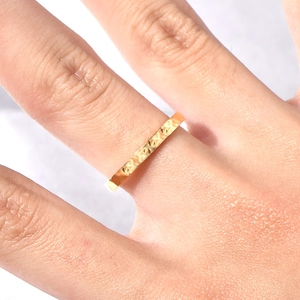 French minimalist hammered texture 18K gold plated titanium steel ring on finger
