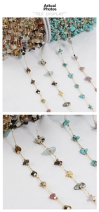 Macro detail of natural multi-color stone chip chains with gold metal for DIY jewelry