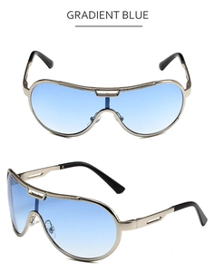 Detail view of oversized pilot sunglasses with gradient blue lenses and silver metal frame