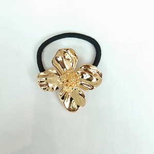 Minimalist golden petal elastic hair tie with irregular metal flower design