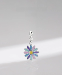 Close-up of a colorful enamel daisy pendant in S925 sterling silver with a lobster clasp