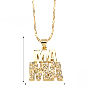 Detail showing gold MAMA pendant necklace with zircon inlay and chain length measurements