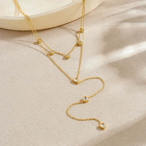 Double-layered gold-plated stainless steel Y-necklace with heart charms and zircons