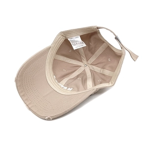 Detail view of khaki cotton baseball cap with adjustable metal buckle and size label