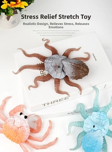 Close-up of soft stretchy octopus and crab stress relief toys on a white background
