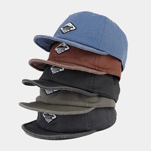 Vintage short brim baseball caps in five colors with embroidered mountain travel patches