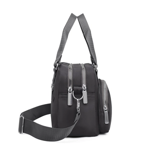 Large capacity black nylon handbag with multiple zipper pockets for women's daily use