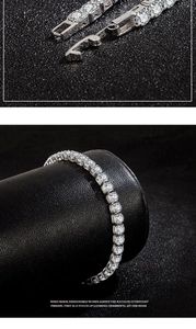 Detail of silver tennis bracelet with cubic zirconia and clasp on black leather stand