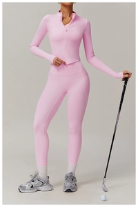 Detail view of pink high-waist yoga set with practical side pockets and matte finish