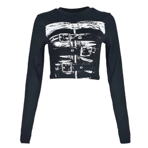 Close-up of black long sleeve crop top featuring punk belt pattern and knit texture