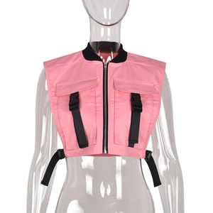 Pink utility vest featuring double flap pockets with black buckles and side straps