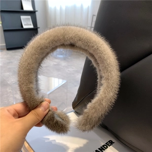 Detailed view of a soft grey plush mink fur headband showing luxurious fluffy texture