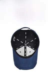 Detail view of baseball cap interior showing moisture-wicking tape and kangaroo embroidery