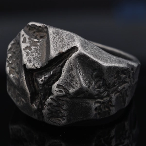 Vintage industrial style stainless steel ring with rustic rock texture and worn finish