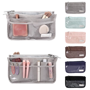 Detailed internal view of multi-color felt organizer bags with functional compartments