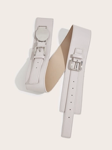 Detail of minimalist cream PU leather wide belt with double square silver buckles