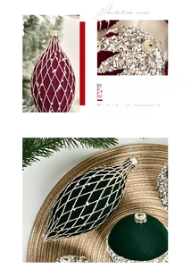 Close-up of velvet Christmas ball ornaments with intricate beadwork and sequin patterns