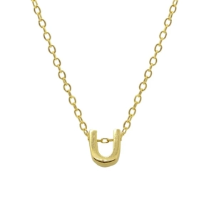 Detailed close-up of a golden letter U pendant on a fine 925 sterling silver chain
