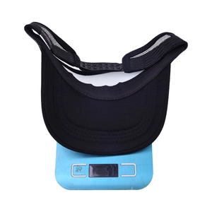 Black mesh empty-top sun visor hat shown being weighed on a digital scale at 51 grams