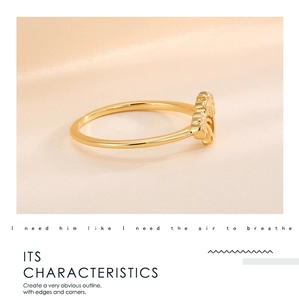 Detailed close-up of a polished gold coconut tree ring with elegant light and shadow