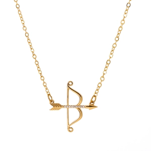 Minimalist gold bow and arrow pendant necklace with white cubic zirconia accents