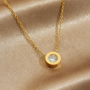 Gold-plated stainless steel necklace featuring a Roman numeral pendant with zircon center