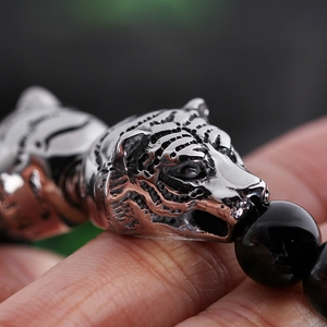 Men's tiger head beaded bracelet with black round beads and silver tiger charm