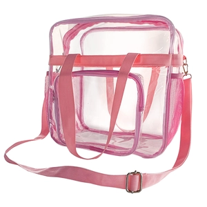 Nahaufnahme der transparenten PVC-Tasche mit rosa Nylongriffen und Netztasche an der Seite
