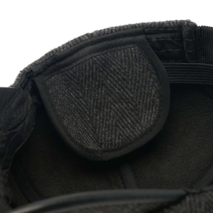 Close-up of winter cap fleece lining and ear protection with adjustable strap