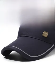 Detailed macro view of navy baseball cap featuring golden metal Chinese emblem and twill fabric
