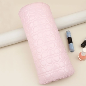 Pink heart-quilted PU leather nail arm rest with high-gloss finish for manicure comfort