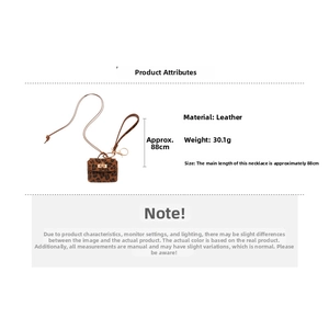 Detail view of leopard print leather pendant with dimensions and product specifications