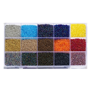 Detailed top view of 15-grid storage box filled with colorful glass seed beads for DIY jewelry